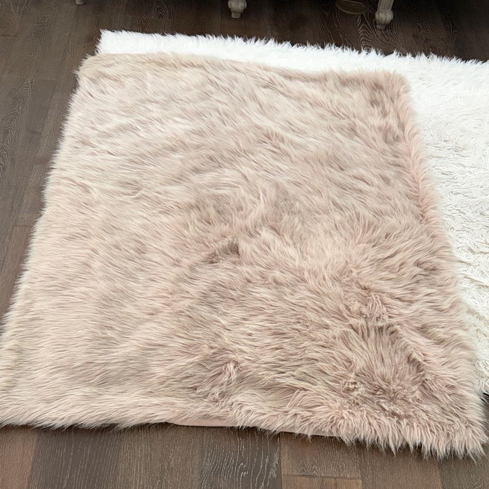 West Elm Soft Faux Furry blanket in Blush Pink